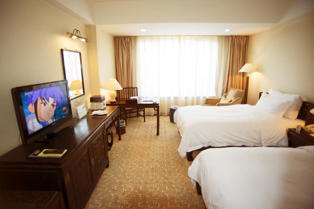 Datong Garden Hotel Quarto foto